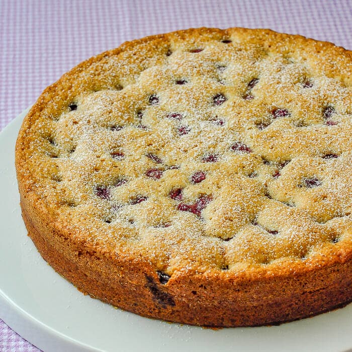 Sunken Grape Almond Cake sprinkled with powdered sugar