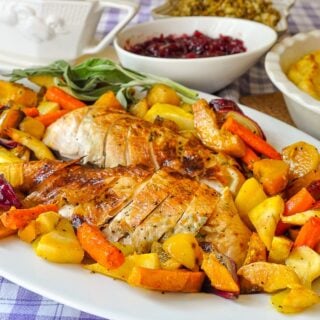 Lemon Sage Butter Roasted Turkey served with Maple Roasted Vegetables.