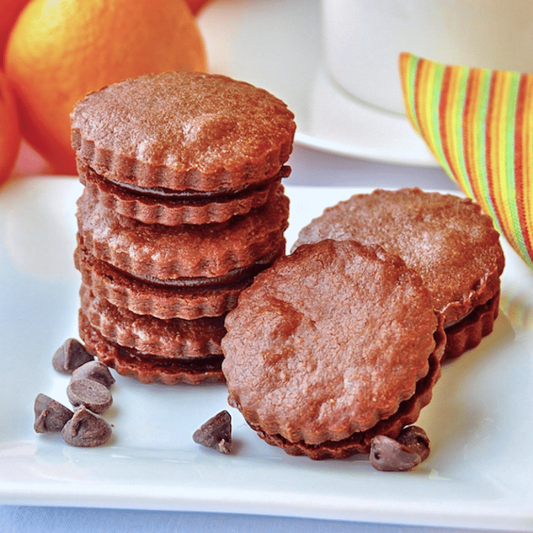 Chocolate Orange Shortbread Sandwich Cookies image cropped square for Google featured image.