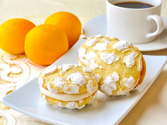 Lemon Cream Cheese Crackle Cookies  shown with coffee in background