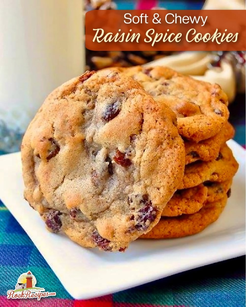Soft Chewy Raisin Spice Cookies stacked in a white plate pictured with a glass of milk. Title text added for social media posts.