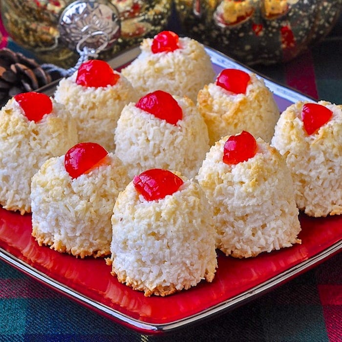 Haystack cookies close up image on red plate with christmas decorations in background