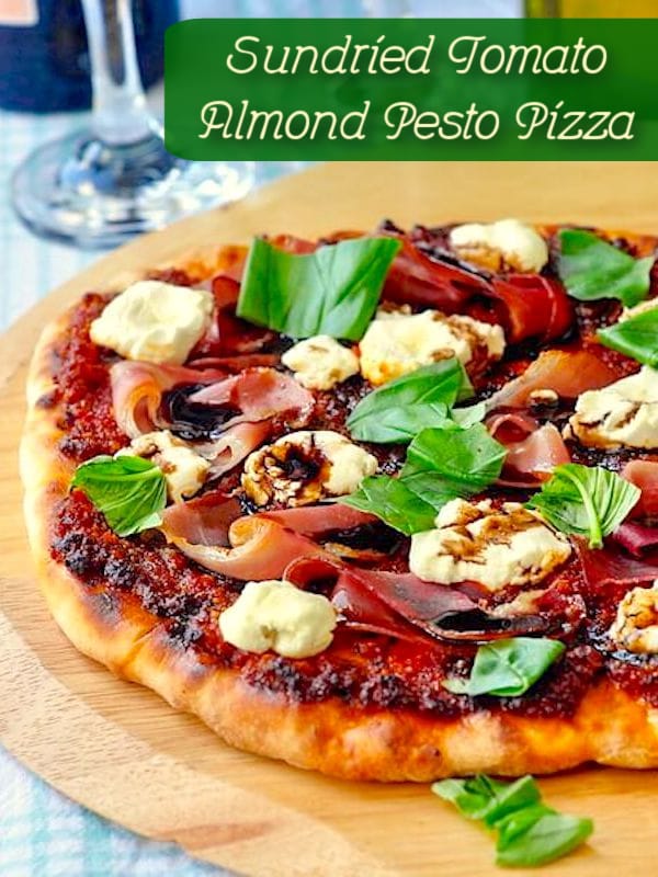 Sundried Tomato Almond Pesto Pizza photo with title text added for Pinterest