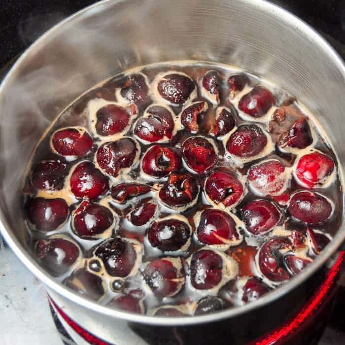 Making homemade cherry pie filling for Mini Black Forest Cheesecakes