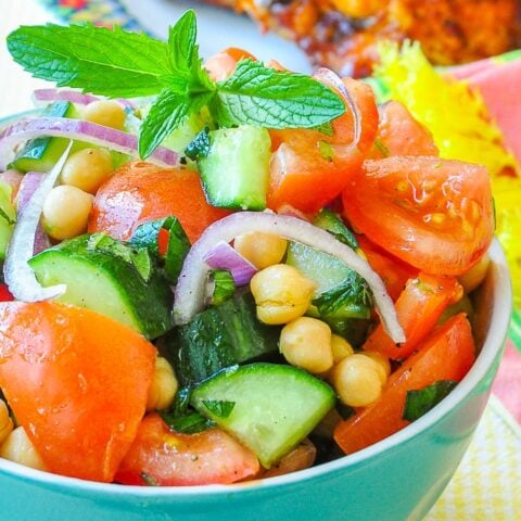 Close up photo of Tomato Cucumber Salad with Chickpeas & Mint