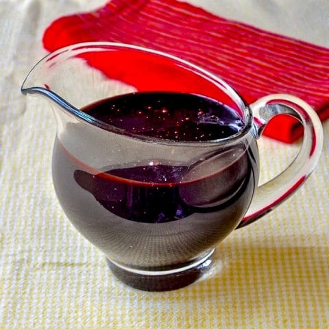 Chocolate Fudge Sauce shown in a clear glass serving jug.