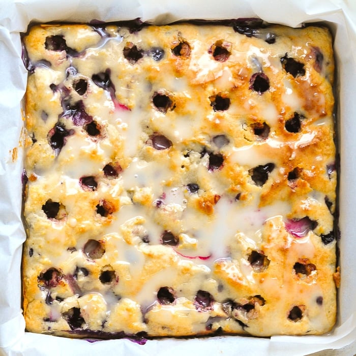 Overhead photo of Blueberry Lemon Drizzle Cake still in the baking pan