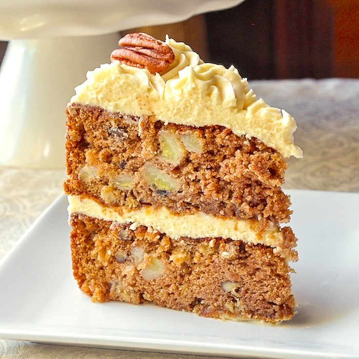 Hummingbird Cake close up photo of single slice on white plate