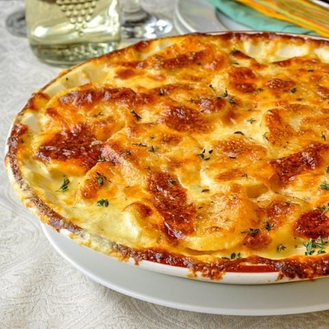 Creamy Dijon Garlic Potatoes Dauphinoise close up phot of finished baking dish