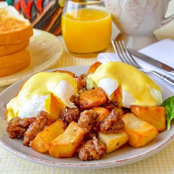 Italian Sausage Hash Eggs Benedict & Parmesan Hollandaise Sauce