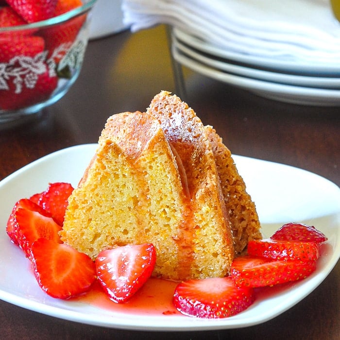 Orange Bundt Cake photo of a single slice on a white plate