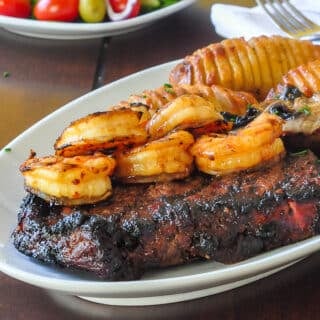 Honey Ginger Soy Surf and Turf close up photo of teh steak and shrimp