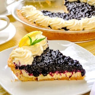 Close up photo of one slice of Lemon Blueberry Cheesecake Pie