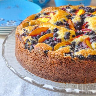 Blueberry Peach Sour Cream Cake photo of uncut cake for featured post image