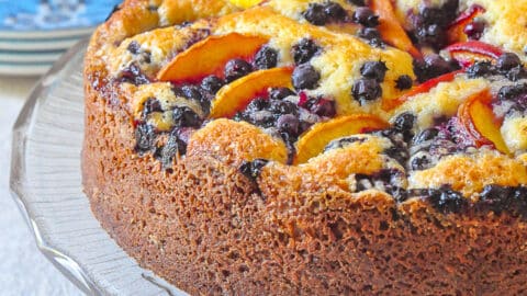 Blueberry Peach Sour Cream Cake photo of uncut cake for featured post image