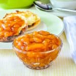 Easy Roasted Peach Jam shown in a small glas serving dish.