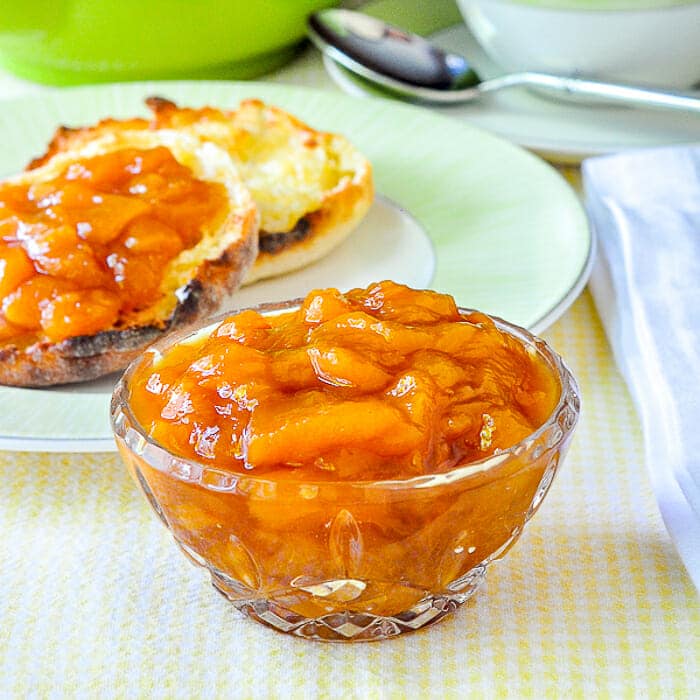 Easy Roasted Peach Jam shown in a small glas serving dish.