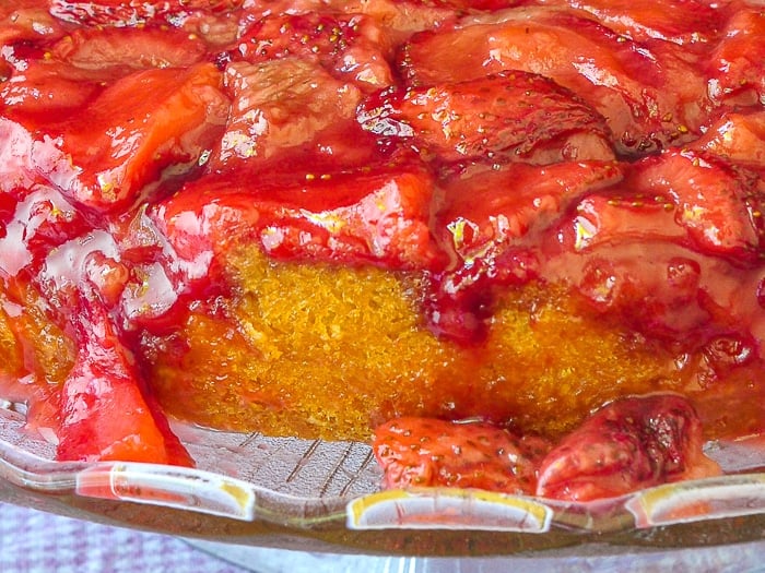 Strawberry Upside Down Cake close up photo of uncut cake