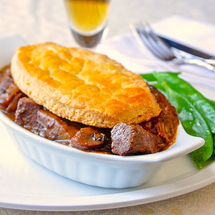 Souvlaki Braised Lamb Pie in a single serving white ceramic dish