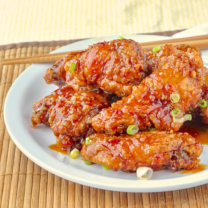 General Tso Chicken Wings close up photo of wings on white plate