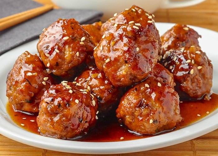 Honey Garlic Meatballs on a white serving plate