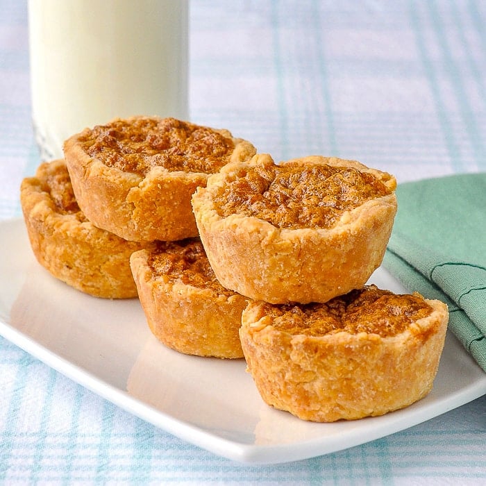 Loaded Butter Tarts on a white tray