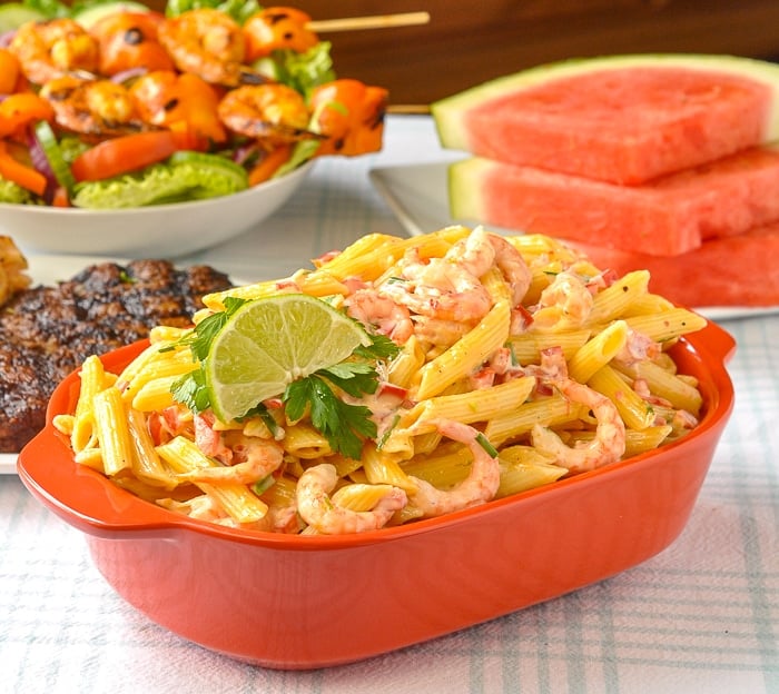 Penne Pasta Salad in an orange serving dish