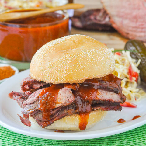 Smoky Spice Honey Barbecue Sauce on a sliced beef sandwich