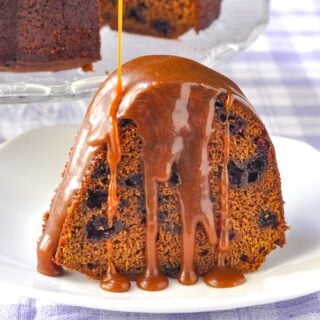 Blueberry Gingerbread Cake with Toffee Sauce close up photo of single slice