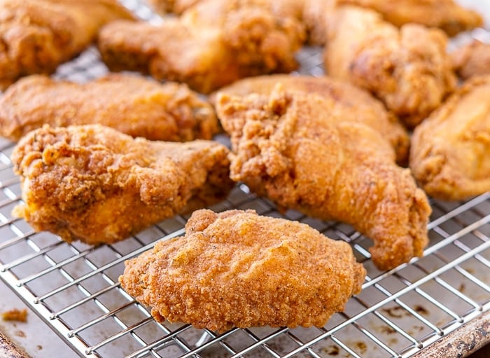 Copycat KFC Wings cooling on a wire rack