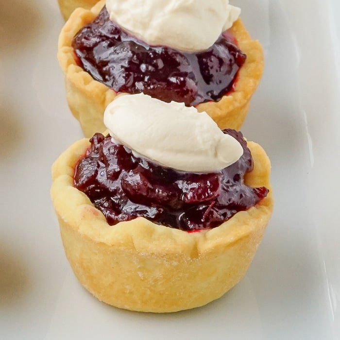 Partridgeberry Jam Tarts on a white serving plate