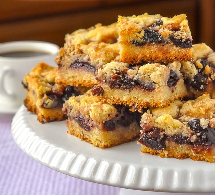 Cherry Almond Squares close up photo of stacked cookies