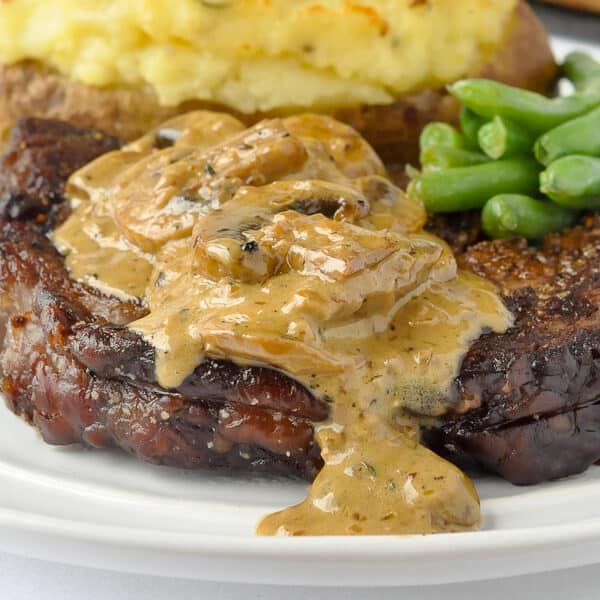 Bourbon Mushroom Sauce on Grilled Rib Eye Steak