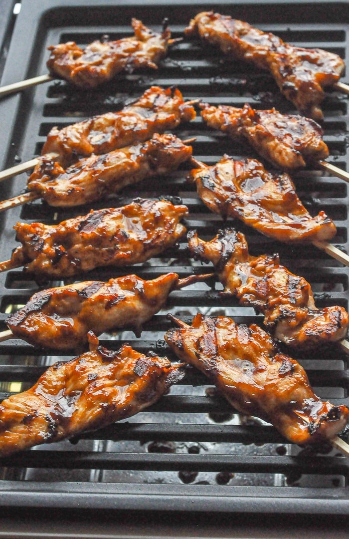 Peanut Butter Sriracha Chicken Satay shown on an electric grill