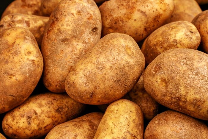 russet potatoes, close up image. Stock photo from Dwepositphotos