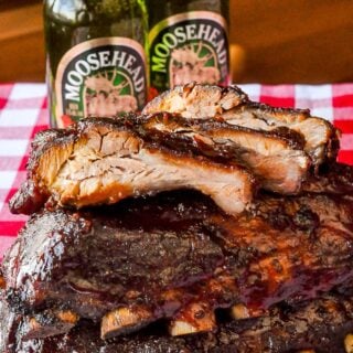 Slow Cooker Barbecue Ribs image showing inside cut of cooked ribs.