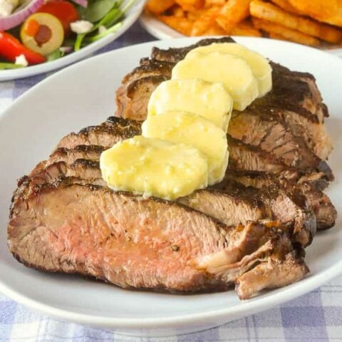 Family Style Garlic Butter Steak close up photo of one serving.