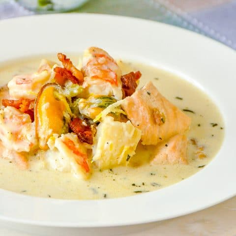 Creamy Seafood Chowder photo of a single serving in a white bowl