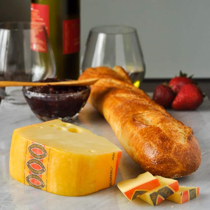 Jarlsberg Cheese with white wine and crusty bread