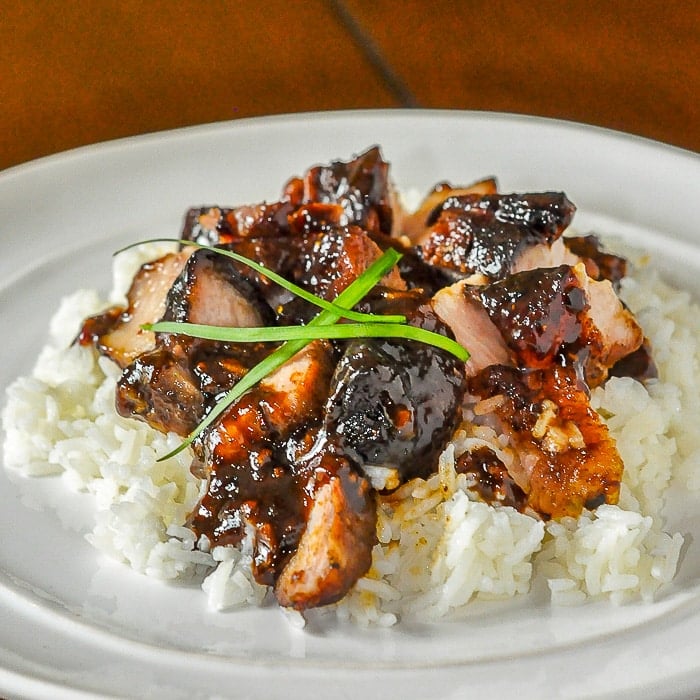 Asian Glazed Pork Belly on a bed of white rice