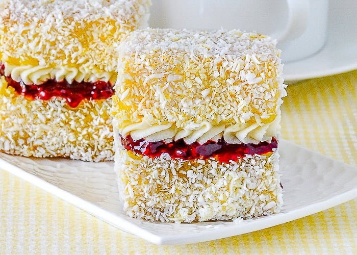 Lemon Lamingtons with Raspberry Compote and vanilla cream Copyright Barry C. Parsons https://www.rockrecipes.com/lemon-lamingtons/