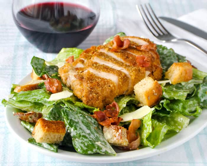 Roasted Garlic Caesar Salad Dressing on a Chicken Caesar Salad