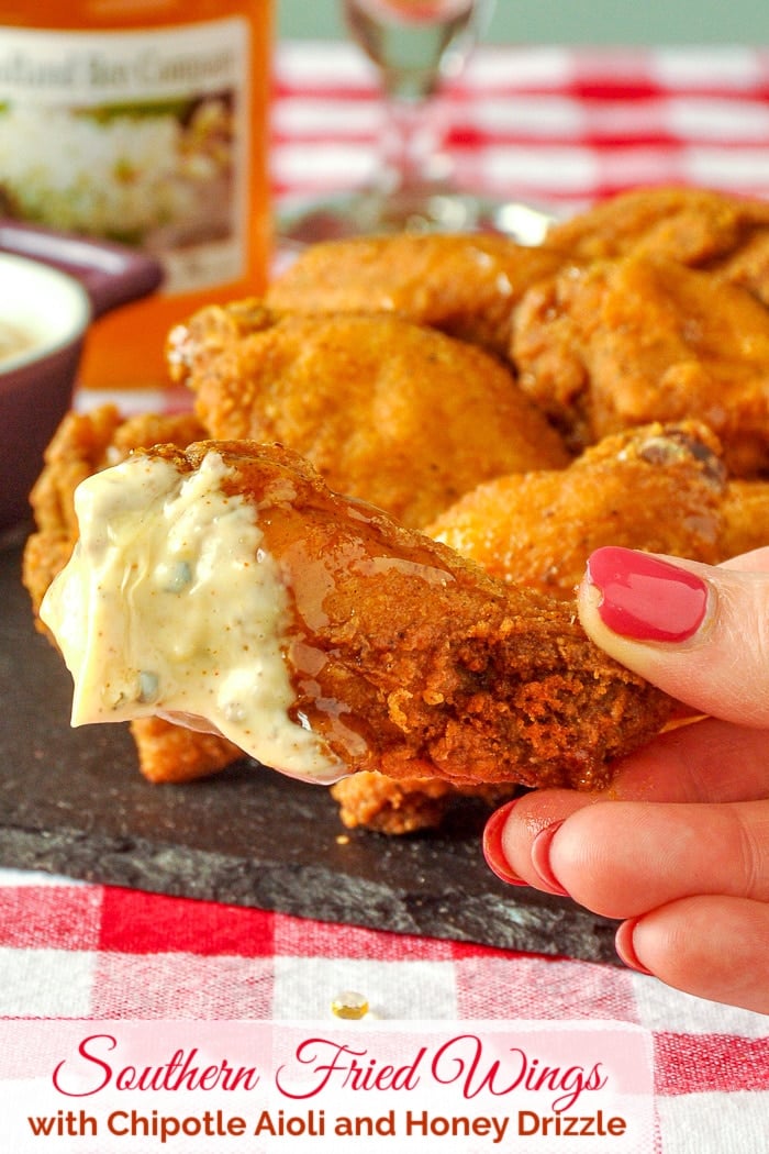 Southern Fried Wings dipped in aioli with title text added for Pinterest