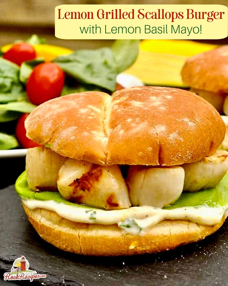 Grilled Scallops Burger with Lemon Basil Mayo photo of one burger with title text added for Pinterest and social media posts.