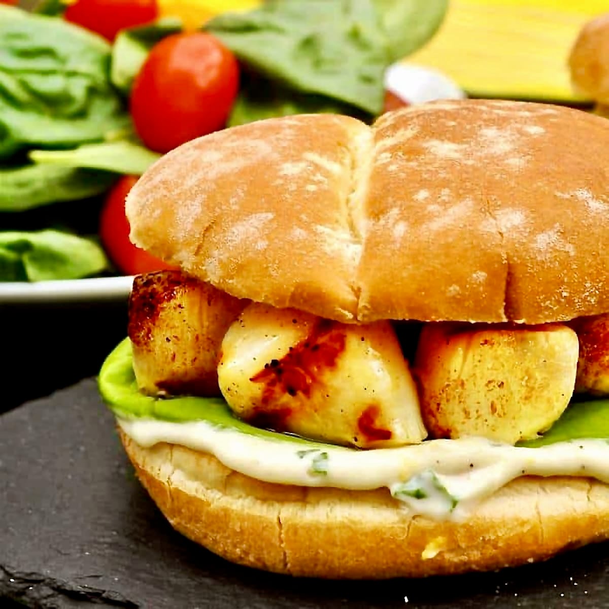 Close Cropped Photo of one Grilled Scallops Burger with Lemon Basil Mayo