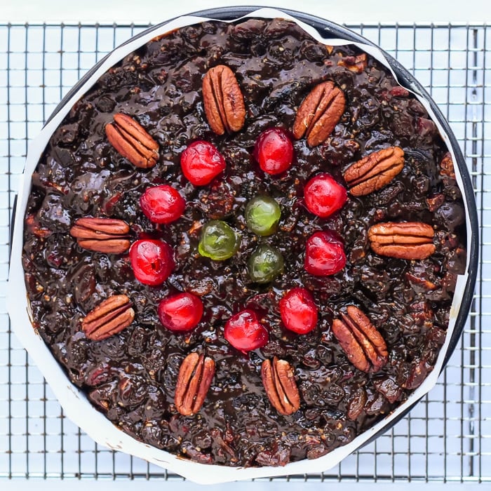 Overhead photo of the fruitcake in a spring form pan ready for the oven