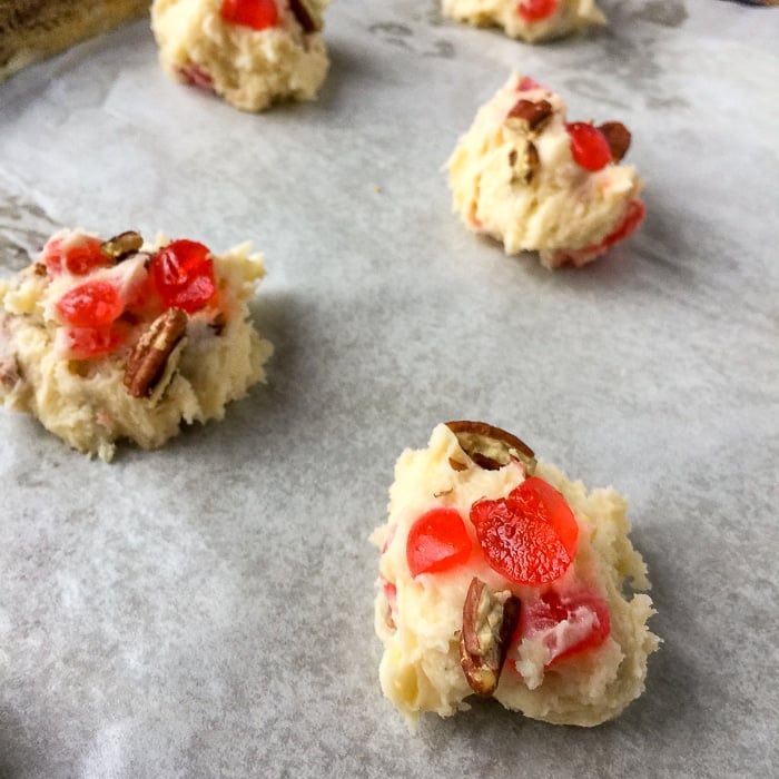 Cream Cheese Cookies with Cherries and Pecans ready for the oven.