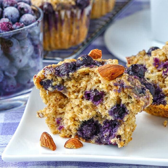 Blueberry Almond Butter Muffins close up of a singoe muffin showing the baked inside view