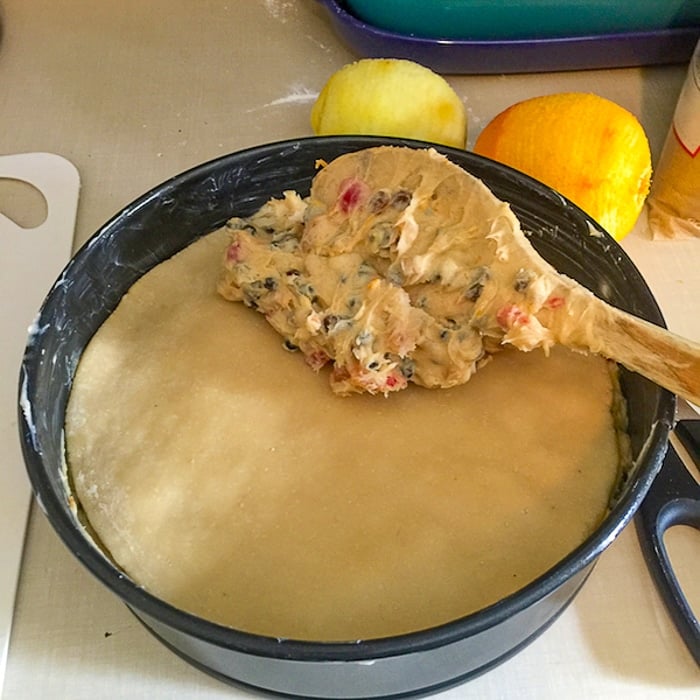 Place the marzipan round over the batter.