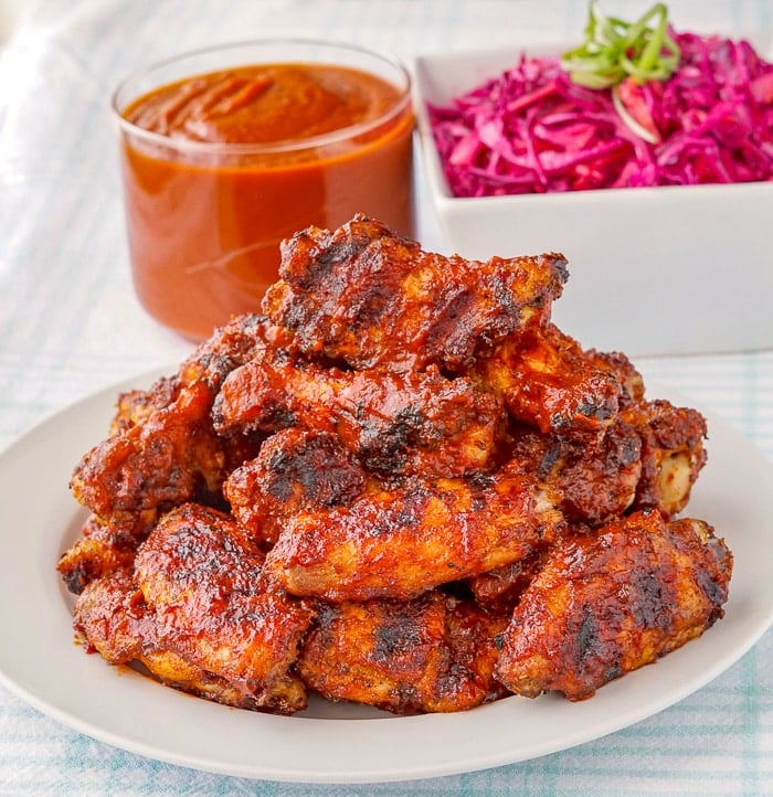 Whiskey Maple Barbecue Sauce wings on a white serving platter